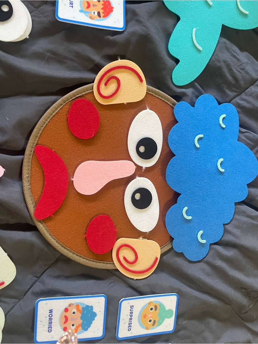 Felt  Emotion Face Playboard with Bright felt pieces with Velcro.
